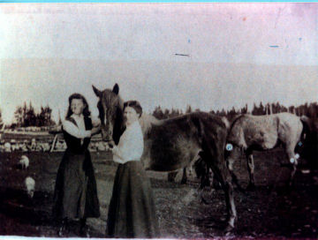 H003-Hilda Harper Benton on left with older sister Pearl Harper Hazlewood on farm in Northern Ontario, Canada. Farm located 6 miles outside of Mattawa.