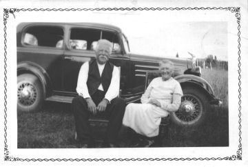 George and Mary Harper. Sitting in front of their 1924 car