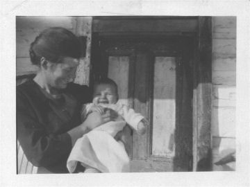 Hilda Harper Benton holding Ray Benton